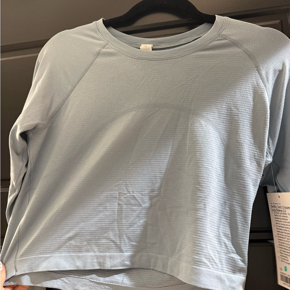 Lululemon NWT  Light Blue Long Sleeve cropped Crewneck Top